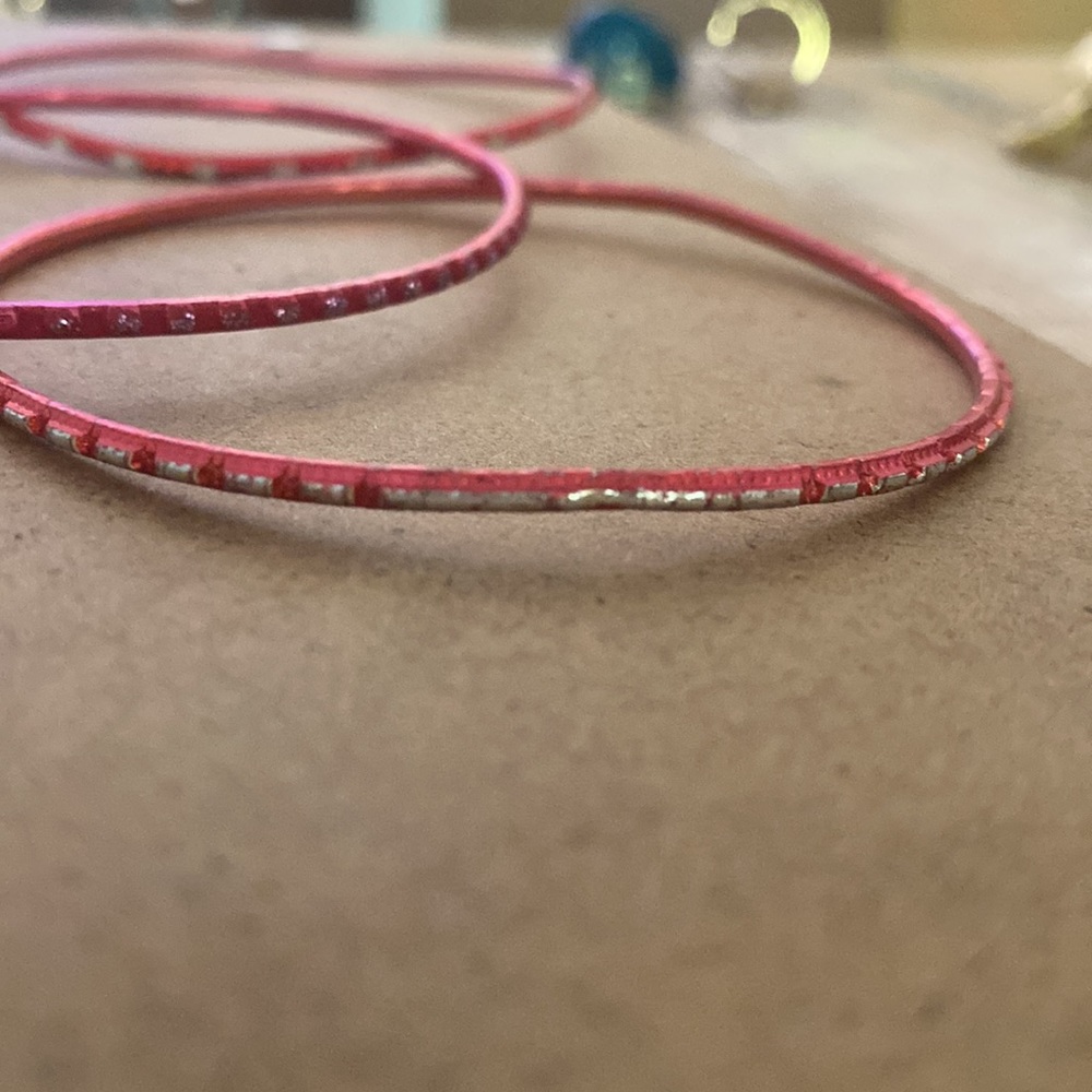 Read Earrings And Four Bangle Bracelets Pretty De… - image 5